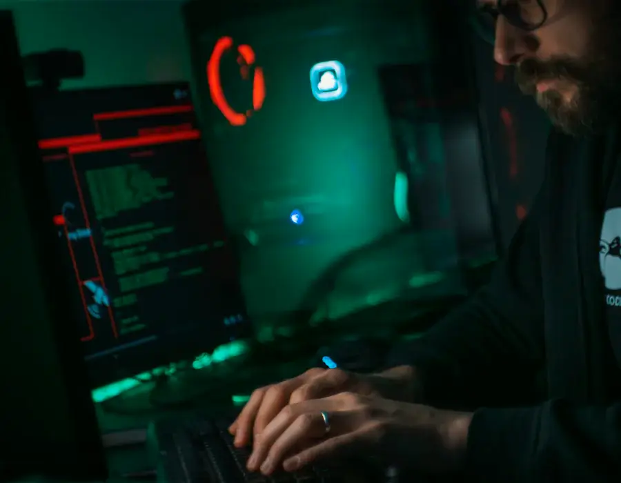 Security analyst reviewing vulnerability scan results at a workstation